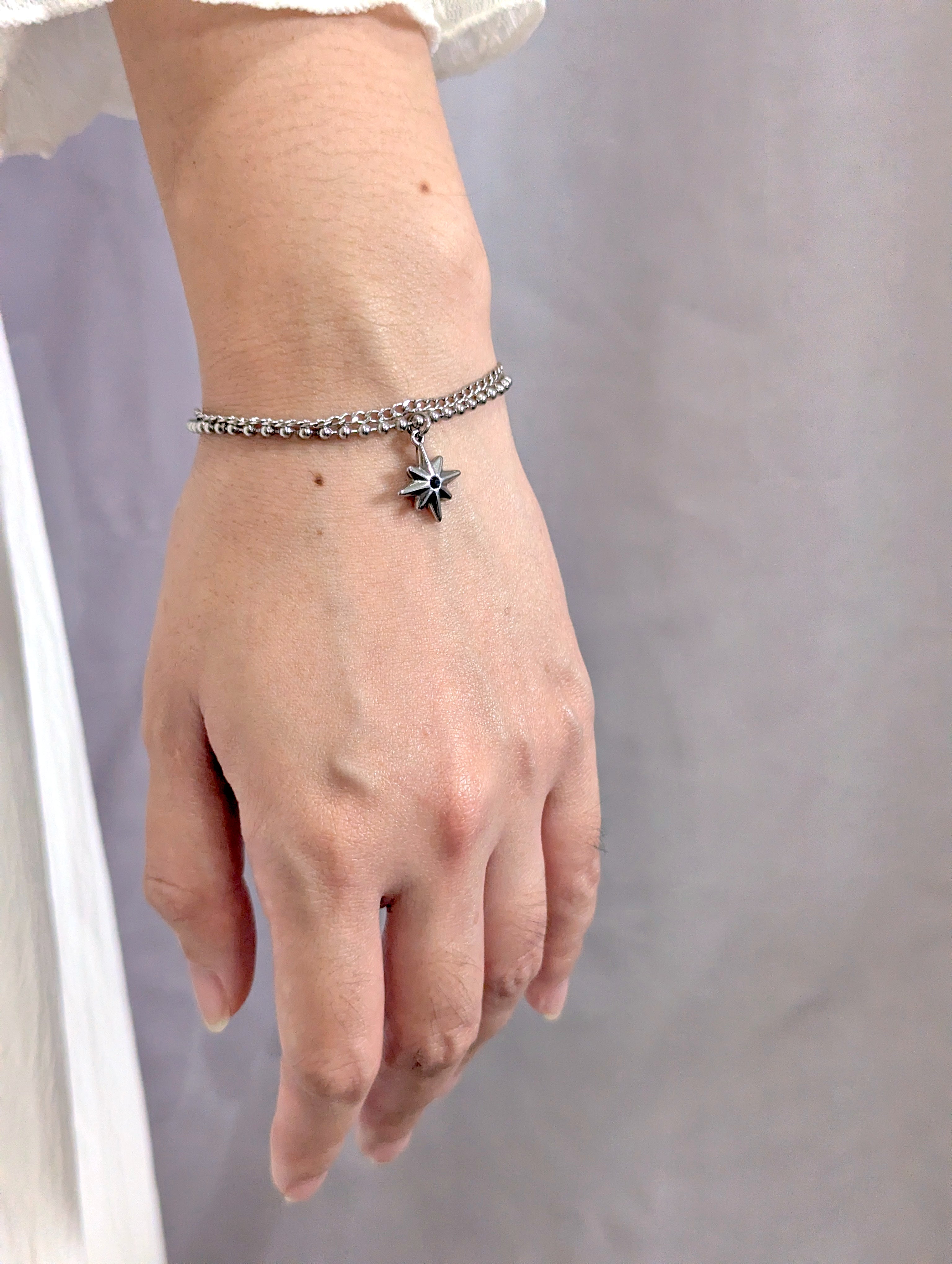 Bracelet with star pendant