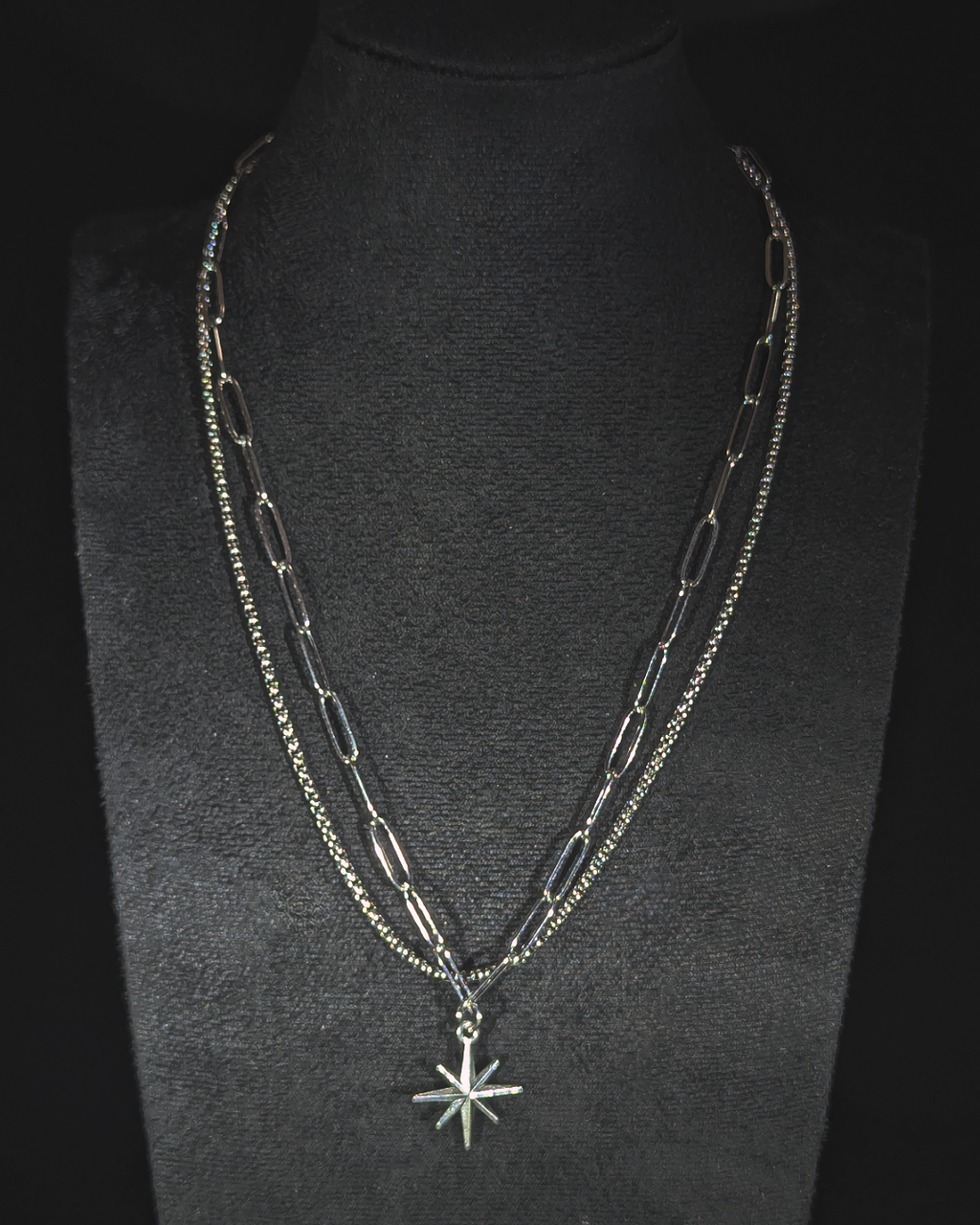 Dual chain necklace with 8-sided star