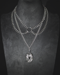 Multi layered chain with winged pendant